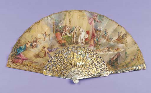 The wedding, the leaf painted with a central couple in an elegant room, surrounded by mischievous putti, some dressed in frock coat and hat, one conducting and others playing instruments, one to the right leaning over the wedding banquet with a carriage waiting nearby, the verso with ladies washing clothes near a water mill with the signature Provost, the mother of pearl sticks carved, pierced and gilt with ladies and putti, in the manner of Donzel--11¾in. (30cm.), circa 1885