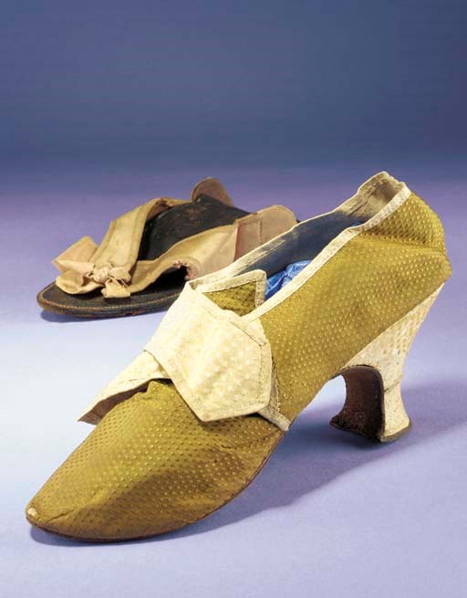 A single lady's shoe, of green/gold silk with cream buckle strap, figured with a spot motif, with blunt pointed toe, pointed tongue and 2¾in. (7cm.) Italian heel, circa 1770s; and a single clog of salmon pink satin, circa 1720s