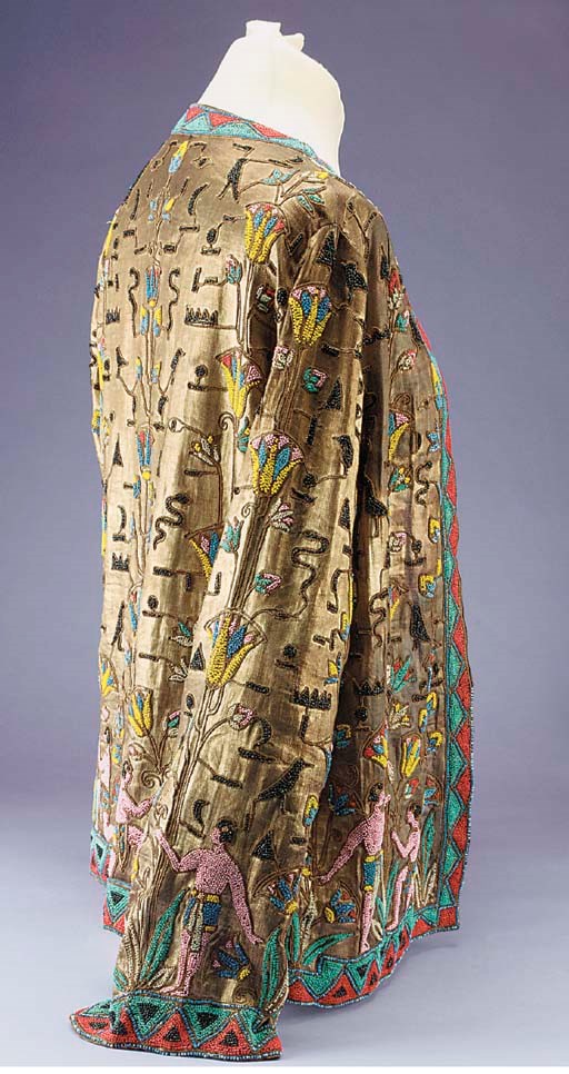 A fine evening jacket, woven with gold metal thread and embroidered with faux hieroglyphic motifs in black beads and with Egyptian figures, birds and stylised flowers in brightly coloured beads, unlabelled but possibly Patou, 1920s