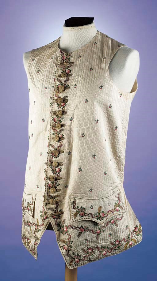 A gentleman's waistcoat, of ivory silk woven with a dot design and brocaded in coloured silks with floral sprigs and ears of corn, the buttons and buttonholes covered with gold foil, circa 1780 See Illustration