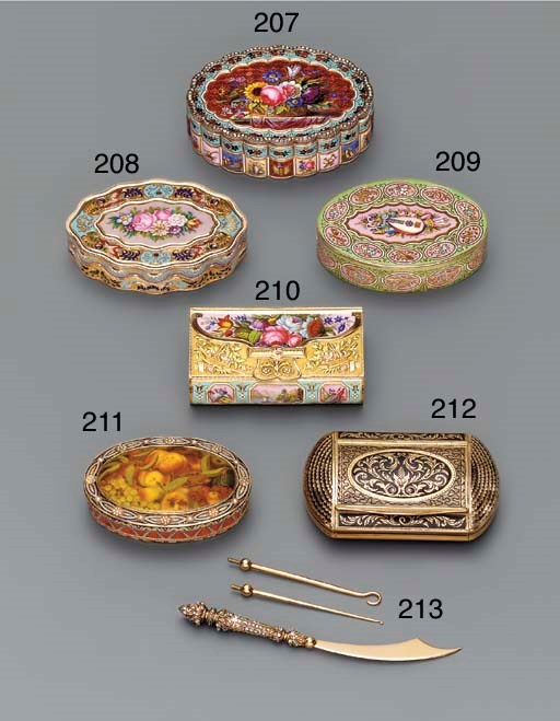 A PLUSH CASE CONTAINING A JEWELLED HANDLE AND THREE GOLD IMPLEMENTS