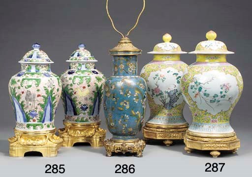 A pair of Chinese porcelain vases and covers