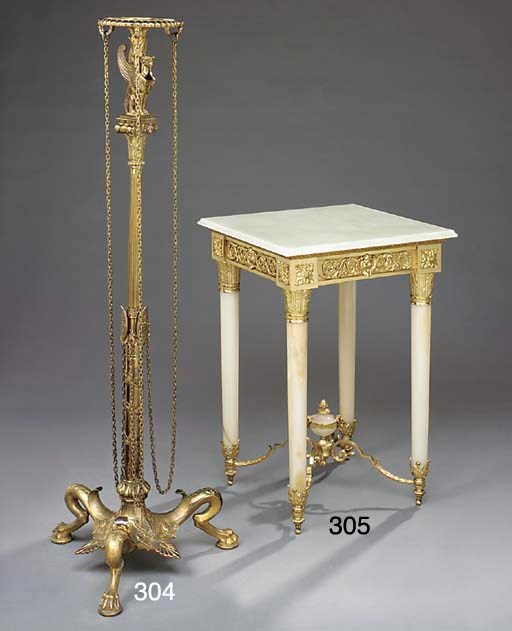 A gilt bronze torchere