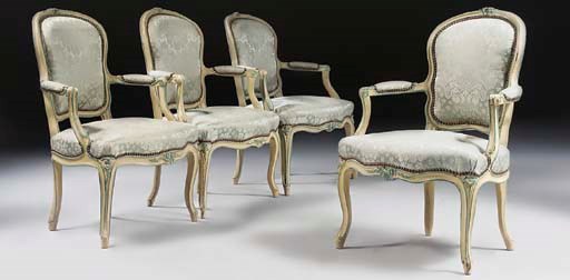A SET OF FOUR LOUIS XV CREAM AND BLUE-PAINTED FAUTEUILS