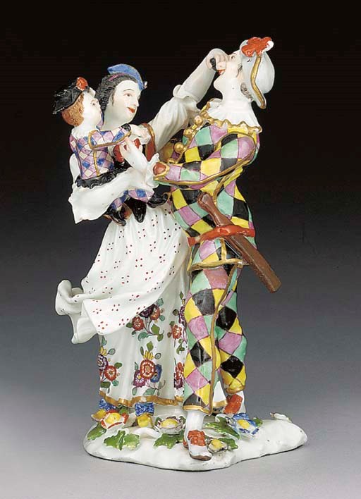 A Meissen group of the Harlequin family