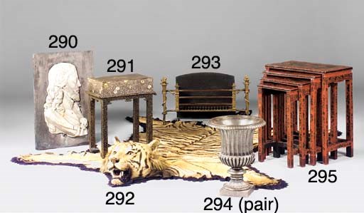 A steel, cast iron and brass mounted firegrate