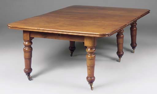 A Victorian mahogany extending dining table