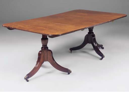A mahogany twin pedestal dining table