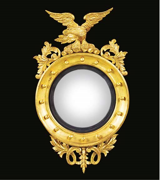 A giltwood convex mirror