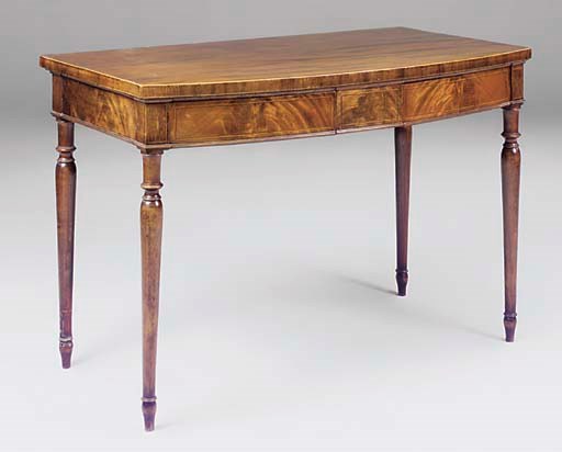 A Regency mahogany and inlaid bowfront serving table