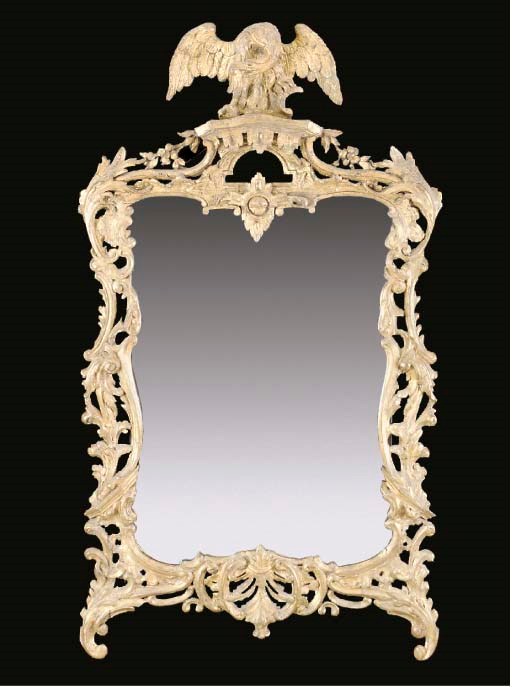 A ROCOCO STYLE GILTWOOD MIRROR