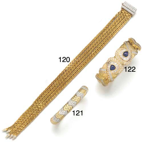 A continental diamond set two colour bangle,