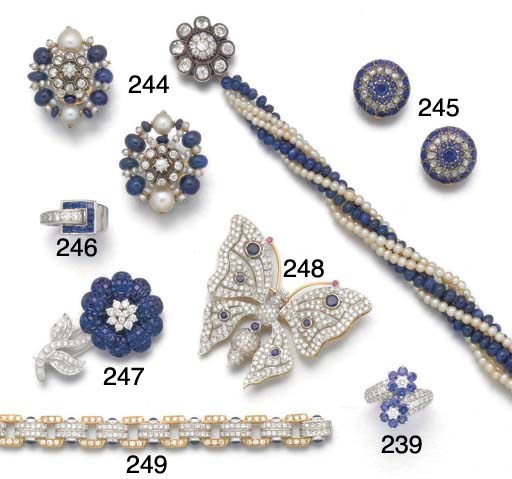 A sapphire and diamond flower brooch,