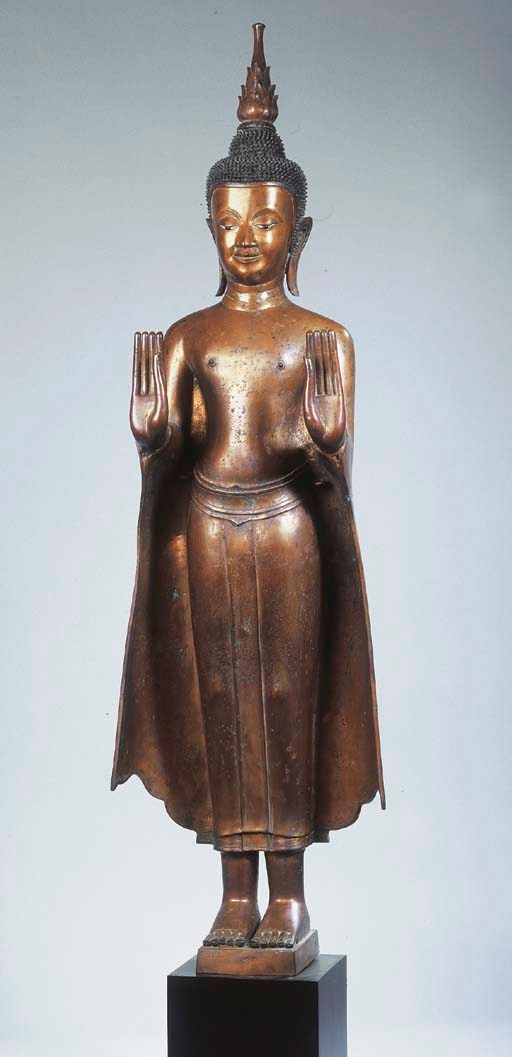 a laos bronze standing figure of buddha sakyamuni