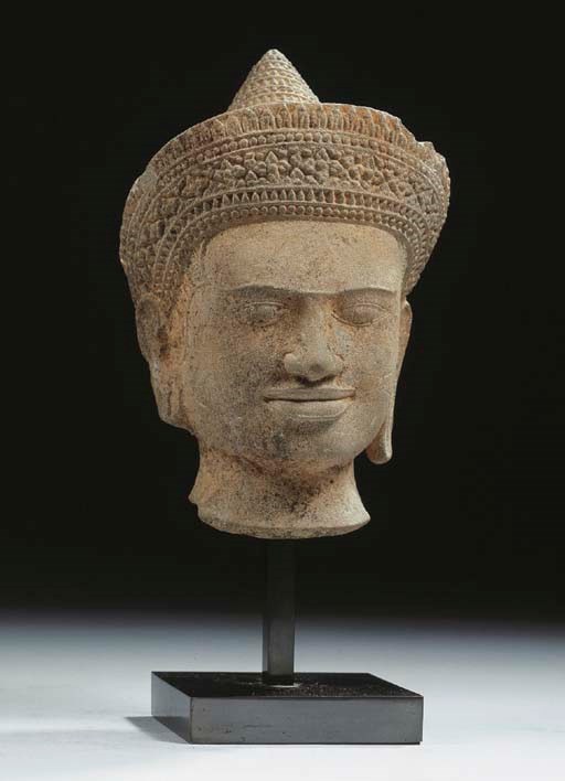 a khmer, angkor vat style, sandstone female head