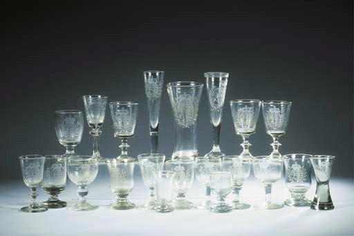 (24) A collection of twenty-one German engraved armorial glasses and three extra glass objects