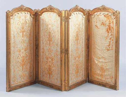 A giltwood four leaf firescreen