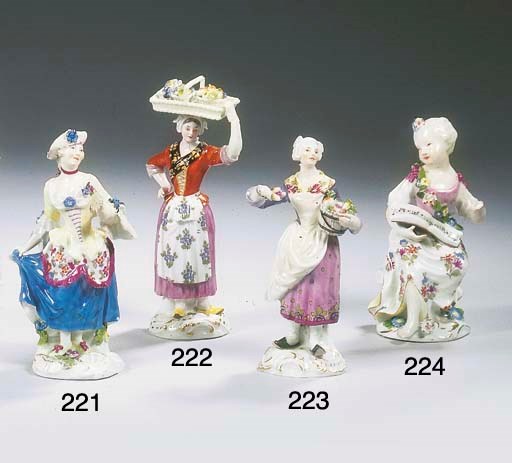 A Meissen porcelain figure of a female fruit hawker