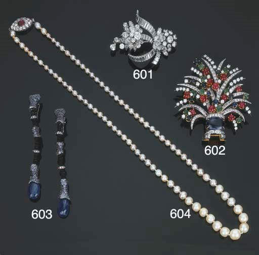 Collana in perle naturali con rubino e diamanti