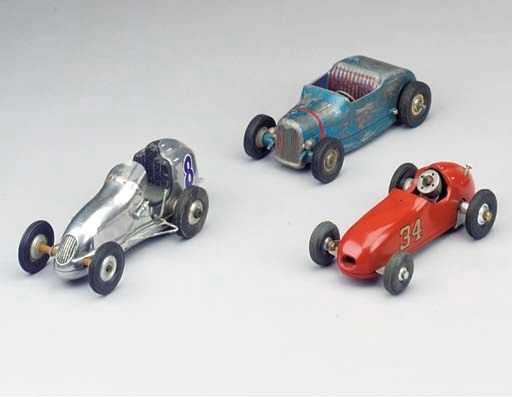 Three small commercial cars,