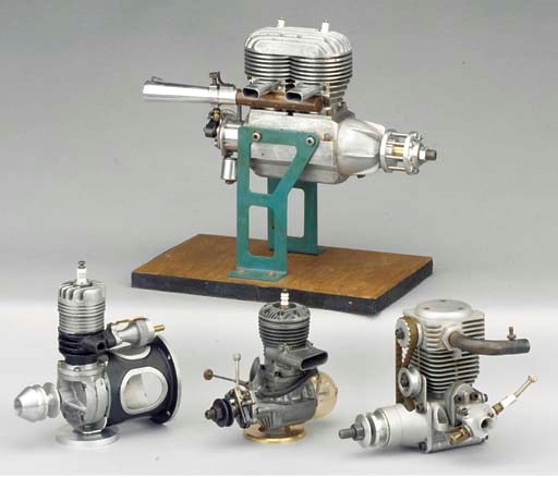 A twin cylinder two stroke 30cc spark ignition engine,