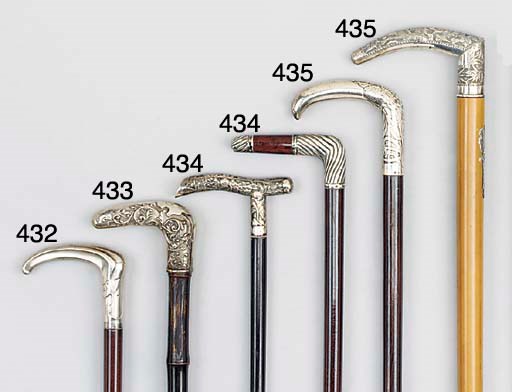 A Continental silver mounted ebony walking cane