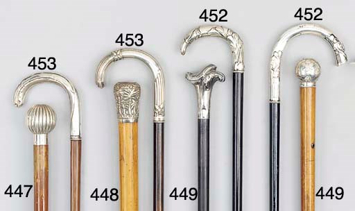 A Continental silver mounted ebonized walking stick