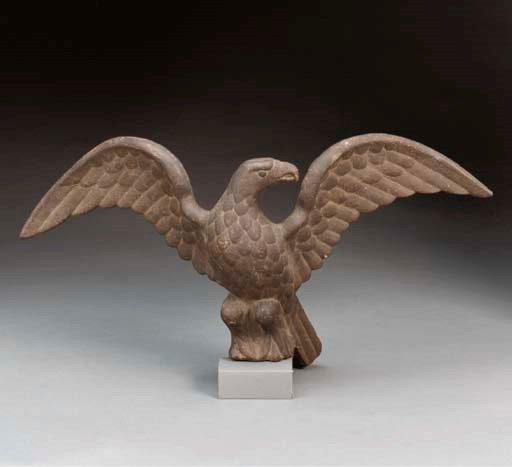 A CAST IRON PILOT HOUSE SPREAD-WINGED EAGLE