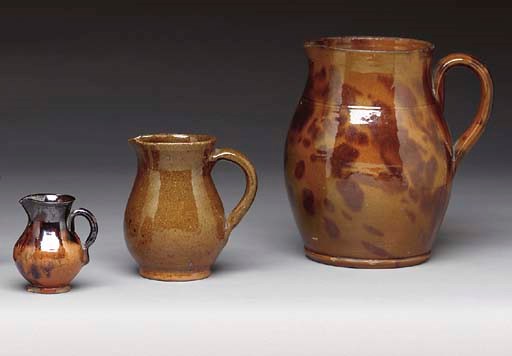 A GROUP OF THREE GLAZED REDWARE ITEMS