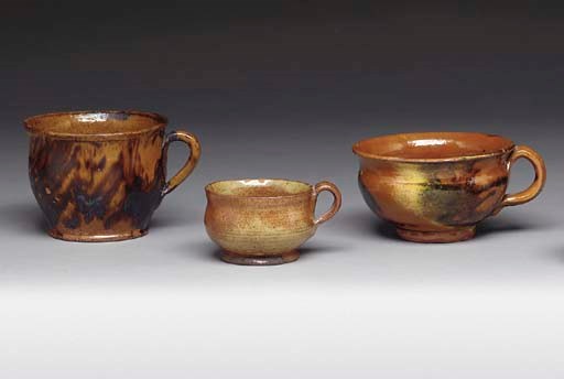 A GROUP OF THREE GLAZED REDWARE PORRINGERS