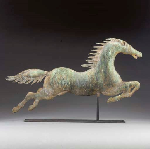 A MOLDED COPPER LEAPING HORSE WEATHERVANE