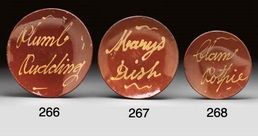 A SLIP DECORATED REDWARE PLATE