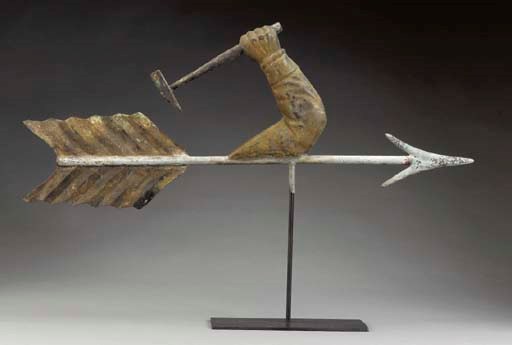 A CAST AND MOLDED COPPER AND ZINC "MECHANIC" WEATHERVANE