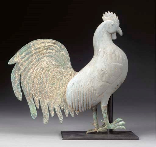 A SMALL CAST ZINC AND MOLDED COPPER ROOSTER WEATHERVANE