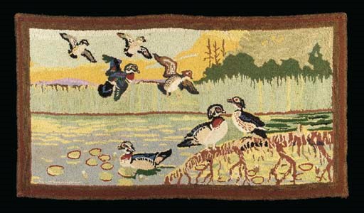 A WOOL AND COTTON PICTORIAL HOOKED RUG