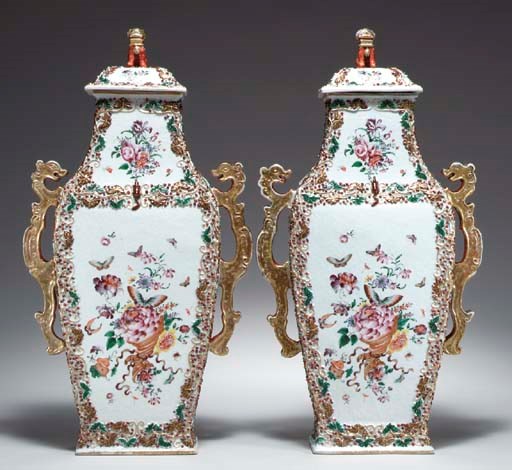 A PAIR OF FAMILLE ROSE VASES AND COVERS