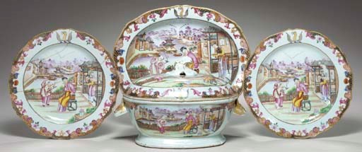 A CRESTED TUREEN, COVER AND STAND AND TWO PLATES