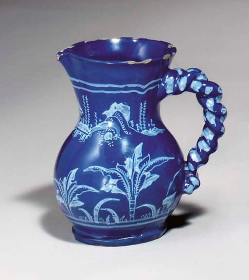 A FRENCH FAIENCE BLEU PERSAN MILK-JUG