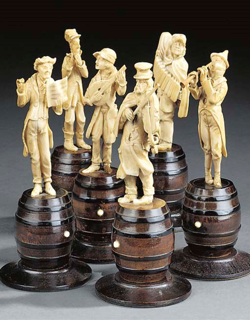 A GROUP OF SIX AUSTRIAN OR GERMAN CARVED IVORY MODELS OF BANDSMEN
