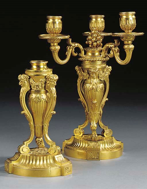 A PAIR OF ORMOLU THREE-LIGHT CANDELABRA