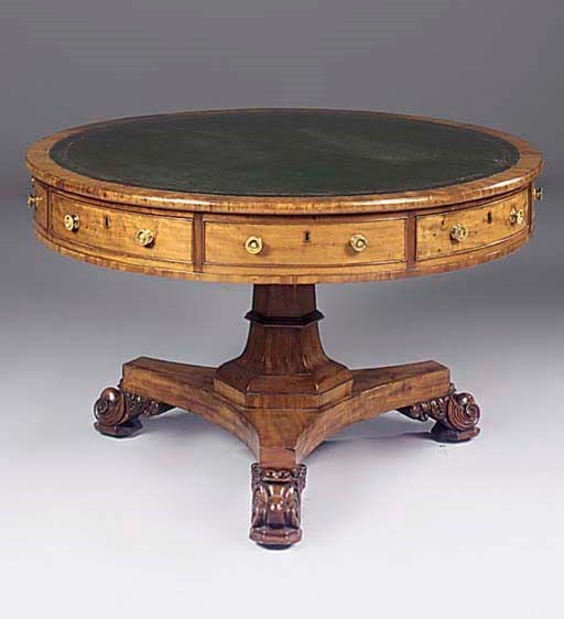 A GEORGE IV MAHOGANY DRUM TOP LIBRARY TABLE