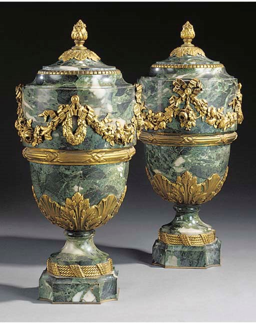 A PAIR OF MARMO VERDE ANTICO AND ORMOLU MOUNTED URNS AND COVERS