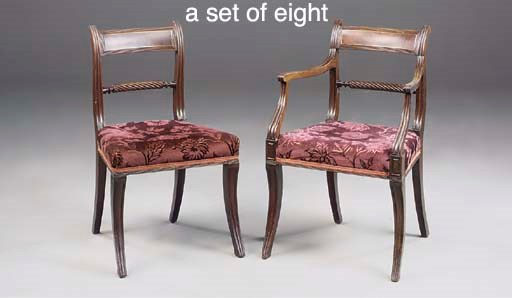 A SET OF EIGHT REGENCY MAHOGANY AND BRASS INLAID DINING CHAIRS