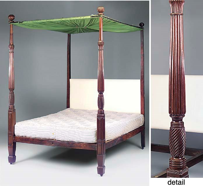 A MAHOGANY FOUR POSTER BED