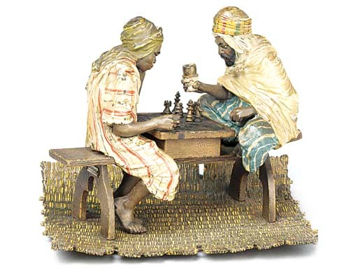 AN AUSTRIAN COLD PAINTED BRONZE GROUP 'THE CHESS PLAYERS'
