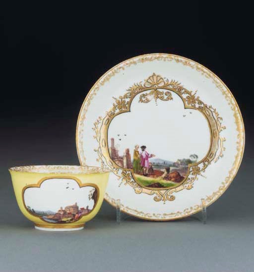 A Meissen yellow-ground teabowl and saucer