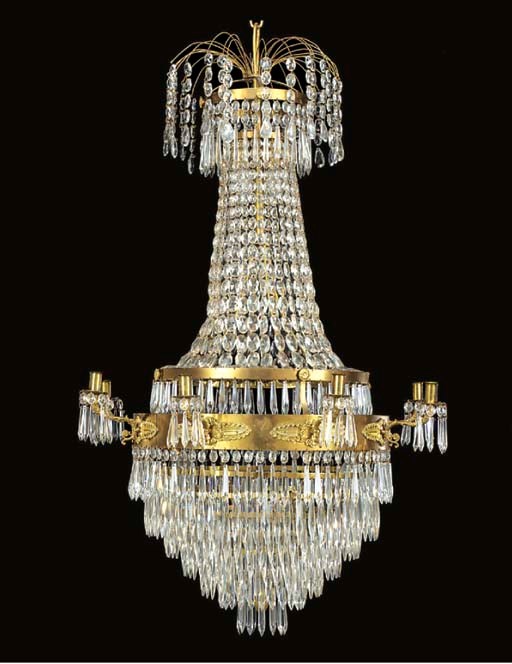 A gilt brass and cut glass eight light chandelier