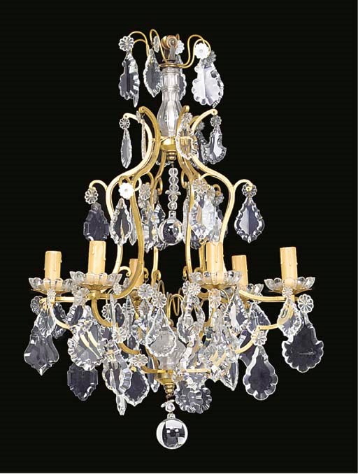 A gilt brass and cut glass hung six light chandelier