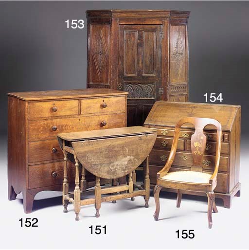 A REGENCY OAK CHEST OF DRAWERS