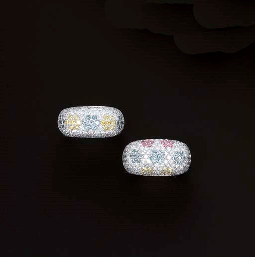 TWO DIAMOND AND TREATED COLOURED DIAMOND RINGS